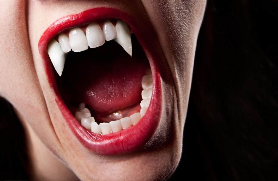 TikToker Super-Gluing Fake Vampire Fangs To Their Teeth For Halloween Hack